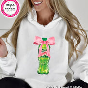 White hoodie with a graphic of a green soda bottle tied with a pink bow. The soda bottle has the text 