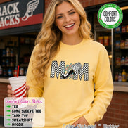 May include: A butter yellow long-sleeve sweatshirt featuring a graphic of the word MOM in a black and white checkered pattern. The letter O is replaced by a black and white winged shoe graphic surrounded by small teal and pink star illustrations.