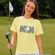 May include: A neon lemon yellow short-sleeve t-shirt featuring the word MOM in a black and white checkered pattern. The letter O is replaced by a white golf ball graphic, and two colorful star shapes are layered over the text design.