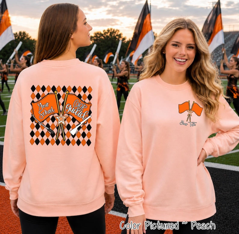 May include: A peach-colored crewneck sweatshirt featuring a back graphic of two orange flags with the text Your School and Color Guard, a star, and a black and orange diamond pattern. The front chest displays a smaller graphic of two orange flags.
