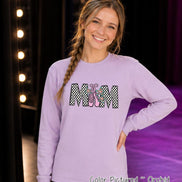 May include: A long-sleeved orchid-colored sweatshirt featuring the text MOM in a black and white checkered pattern. The letter O is replaced by a pair of pink ballet slippers with ribbons and small colorful star accents on the laces.
