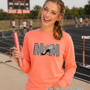 May include: A long-sleeve melon-colored sweatshirt featuring the word MOM in a black and white checkered pattern. The letter O is replaced by a black track shoe with a white wing and teal star accents. The sweatshirt is held with a pink relay baton.