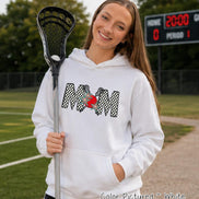 May include: A white hooded sweatshirt featuring a graphic on the chest with the word MOM in a black and white checkered pattern. The letter O is replaced by a red circle with two crossed lacrosse sticks and two teal star accents.
