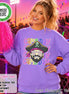 May include: A violet long-sleeve sweatshirt featuring a graphic of a pirate wearing star-shaped sunglasses. The text "Game Day" is repeated in colorful, stitched-style lettering behind the pirate. A bright pink pom-pom is held to the side.