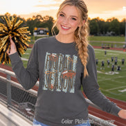 May include: A charcoal gray long-sleeve shirt featuring a graphic print with the text FOOTBALL SEASON in dark brown letters. The design includes light blue vertical brush strokes, white dots, and brown football illustrations on the front.