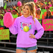 A neon violet hooded sweatshirt featuring a graphic print on the chest. The design includes a yellow softball, a blue megaphone with the text GAME DAY, a pink star, and a blue lightning bolt, all surrounded by black polka dots.