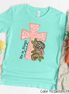 He Is Risen Pink Leopard Cross Easter Tee